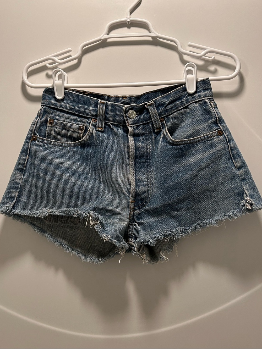 Levi's Light Blue Frayed Hem Denim Shorts